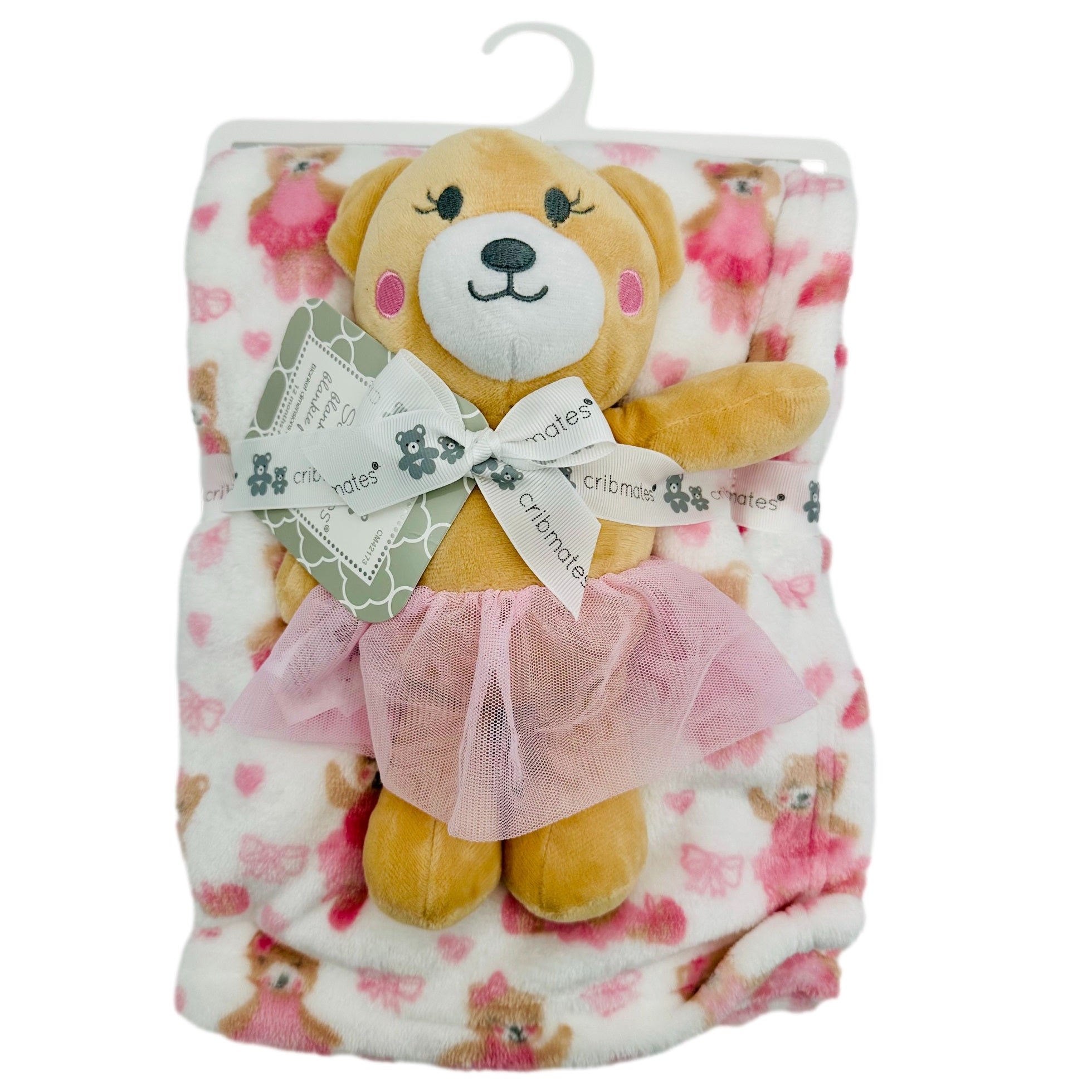 Wrapped blanket with teddy bear wearing pink tutu.